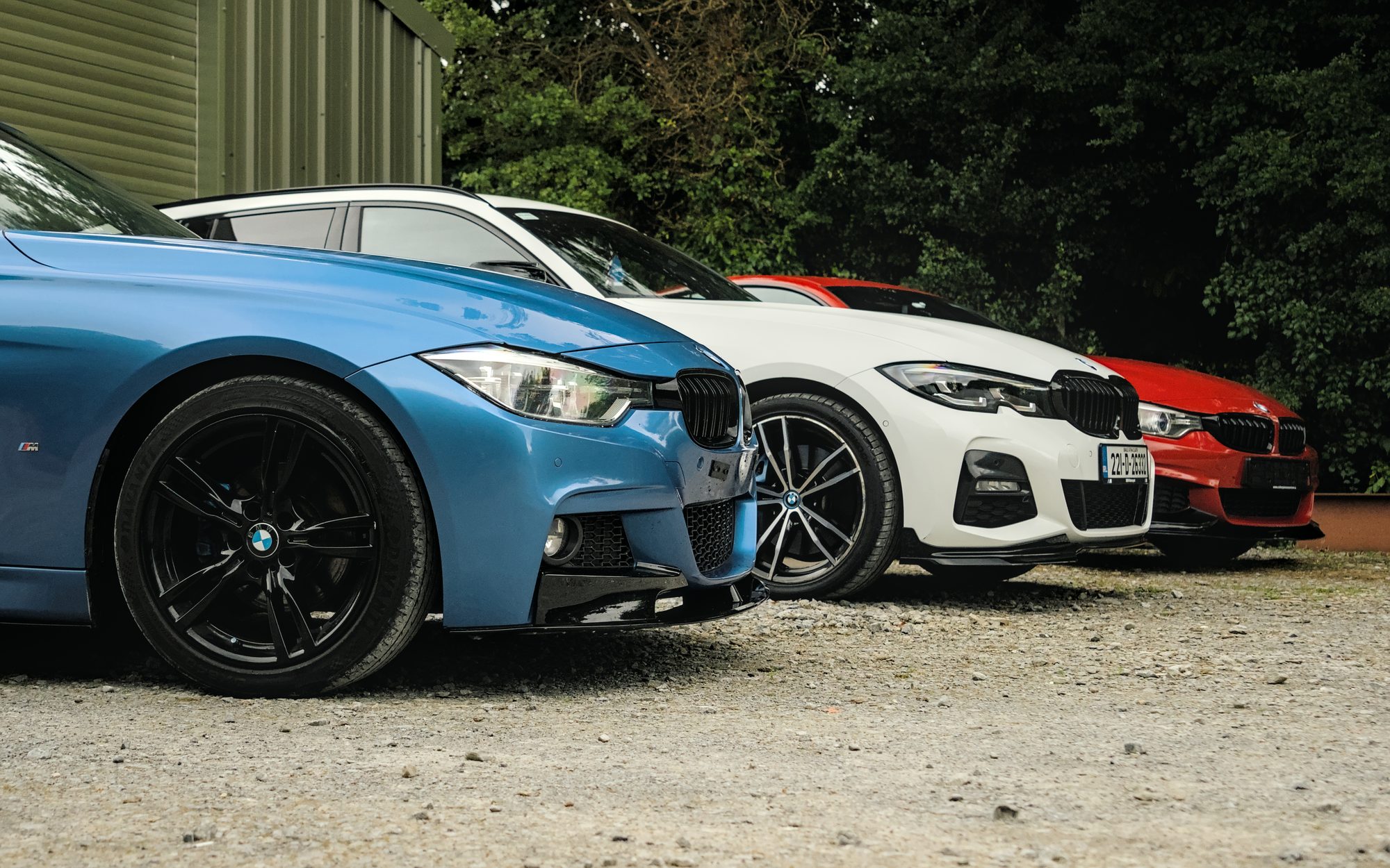 BMW line-up outside the workshop