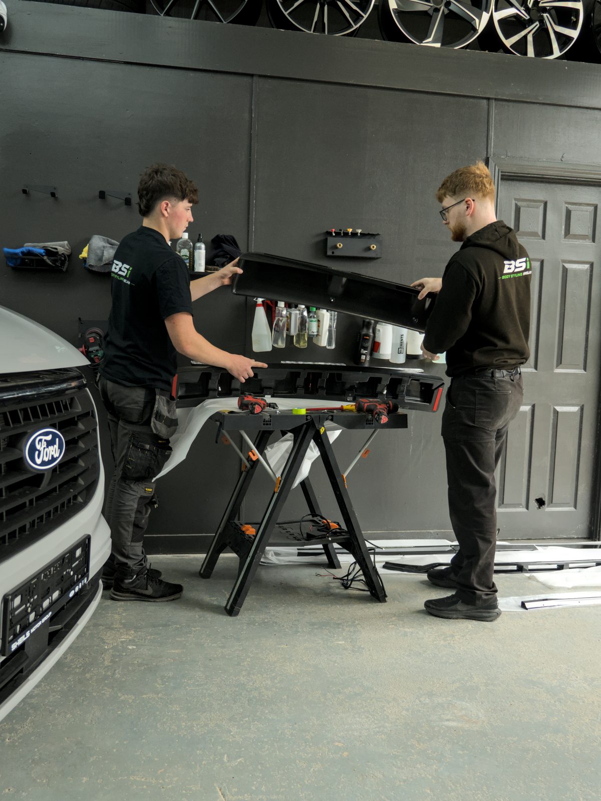 The BSI team building up a roof light pod